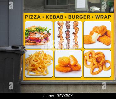 Fotomenü für Fast-Food-Restaurants zum Mitnehmen, Ottery St Mary, Devon, England, Großbritannien Stockfoto
