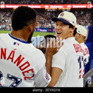 Los Angeles, United States. 04th July, 2026. Los Angeles Dodgers Shohei Ohtani shares a light moment with Teoscar Hernandez in the dugout during the ninth inning against the San Diego Padres at Dodger Stadium in Los Angeles on Saturday, July 4, 2026. Photo by Jim Ruymen/UPI Credit: UPI/Alamy Live News Stockfoto