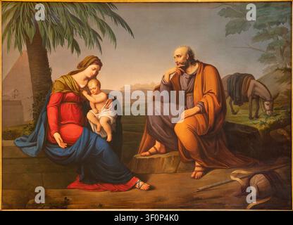 LUCCA, ITALIEN - 23. JUNI 2026: Das Gemälde der Ruhe auf der Flucht nach Ägypten in der Kirche Basilica di San Frediano von G. Martini (1824). Stockfoto