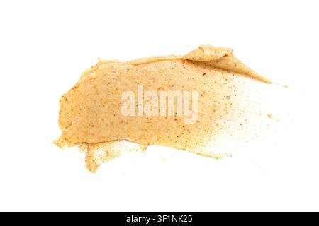 Aprikosenpeeling-Abstrich isoliert, Körperpeeling Creme Probe, organische Peeling Gesichtsmaske, Zucker Peeling-Abstrich Textur auf weißem Hintergrund Stockfoto