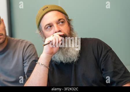 Mitarbeiter der Agentur nehmen an einem Management-Trainingsteilnahme. Stockfoto