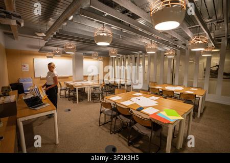 Mitarbeiter der Agentur nehmen an einem Management-Trainingsteilnahme. Stockfoto