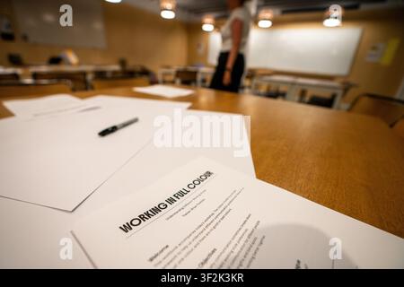 Mitarbeiter der Agentur nehmen an einem Management-Trainingsteilnahme. Stockfoto