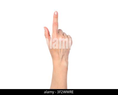 Weibliche Hand isoliert auf weißem Hintergrund. Die Hand einer Frau zeigt mit dem Zeigefinger auf etwas. Ansicht von oben. Stockfoto