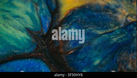 Glitzer-Explosion, unscharfer Bokeh-Pigment-Austritt, Tinte Stockfoto