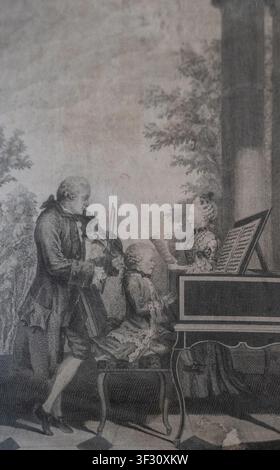 Vater Mozart mit seinem Sohn und seiner Tochter, die gemeinsam Musik spielen, Kupferstich von Jean Baptiste Delafosse aus dem Jahr 1764 Stockfoto
