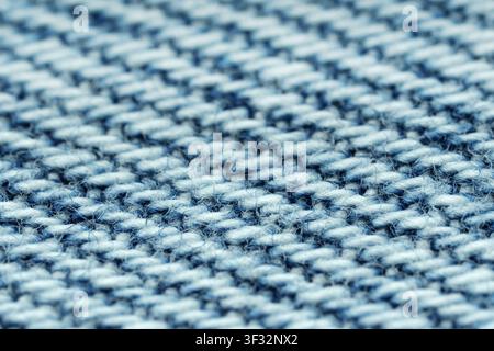 Blaue Denimtextur. Nahaufnahme des Hintergrunds. Stockfoto