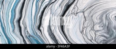 Hellblauer und grauer abstrakter flüssiger Kunsthintergrund mit flüssigem Marmoreffekt in Acrylgußmalerei-Stil. Stockfoto