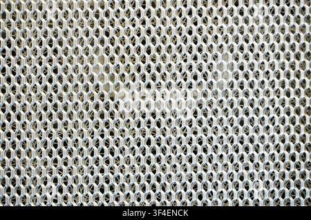 Nahaufnahme eines Metallmaschenmusters. Hintergrund und Textur für Design Stockfoto
