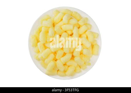Glutenfrei. Glasierte Maisstangen auf einem Teller isoliert auf weißem Hintergrund. Gefüllter süßer Snack. Vogelperspektive. Mit Zucker überzogene Maisstangen. Stockfoto
