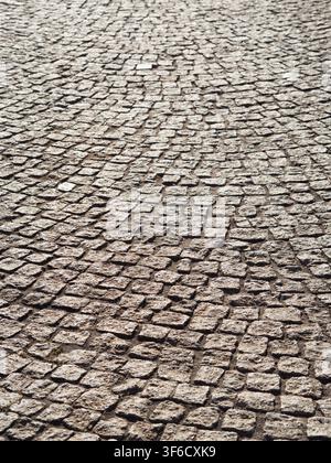 Nahaufnahme einer Kopfsteinpflastertextur, Olbia, Sardinien Stockfoto