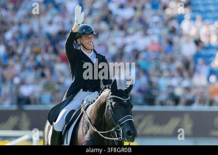 Aachen, Deutschland. 12. Aug., 2026. Pferdesport: Weltmeisterschaften, Dressur, Grand Prix Teamfinal. Der belgische Reiter Justin Verboomen reitet sein Pferd Zonik Plus über den Kurs. Credit: Rolf Vennenbernd/dpa/Alamy Live News Stockfoto