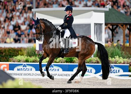 Aachen, Deutschland. 15. Aug., 2026. Reitsport: Weltmeisterschaften, Dressur, Grand Prix Freestyle. Die britische Dressurreiterin Becky Moody, auf Jagerbomb, kämpft auf der Strecke. Credit: Uwe Anspach/dpa/Alamy Live News Stockfoto