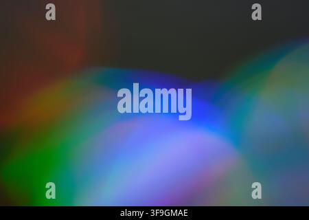 Hintergrund mit dunklem Raum und farbenfrohen Flecken Stockfoto