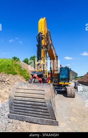 Eimer an einem Bagger auf einer Baustelle Stockfoto