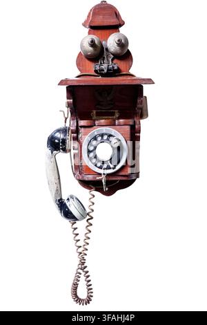 Die Ausschnitt eines Vintage-Wandtelefons auf weiß isoliert. Stockfoto