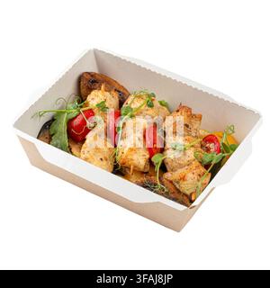 Gegrillte Hähnchenspieße mit Gemüse in der Box Stockfoto