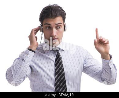 Der junge Callcenter-Mitarbeiter vor einem weißen Hintergrund Stockfoto