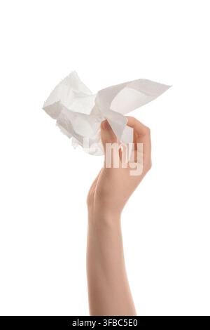 Weibliche Hand mit zerknittertem Papiertuch auf weißem Hintergrund Stockfoto