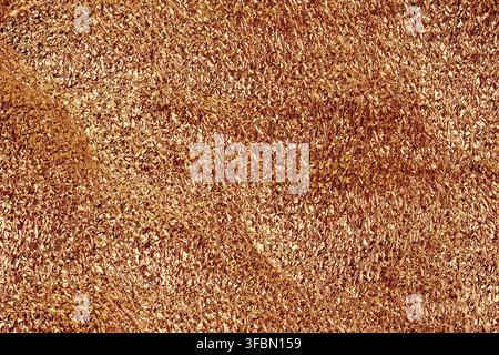 goldene zerknitterte Folienstruktur, Nahaufnahme Stockfoto