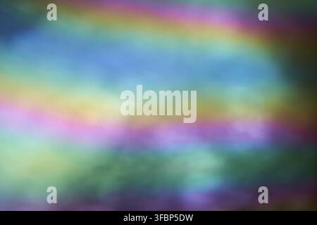 Unscharfer holografischer Regenbogenfarben. Abstraktes helles holografisches Texturdesign zum Zeichnen und als Hintergrund. Minimalistischer Stil. Stockfoto