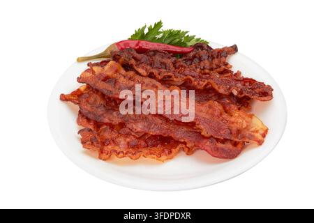 Gebratene Scheiben Speck isoliert auf einem Teller Stockfoto
