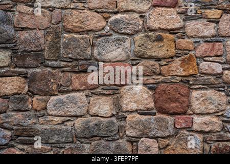 Textur einer alten Steinmauer Stockfoto