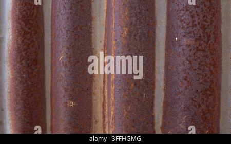 Rostige Wellblech-Zinkmetall-Platten-Hintergrund-Texturdetail Stockfoto