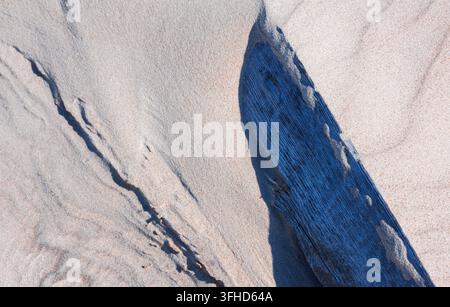 Natürlicher weißer Sandmuster-Hintergrundtextur Stockfoto