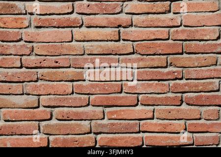 Verwitterte rote Ziegelmauer nahtlose Architektur-Hintergrundtextur Stockfoto