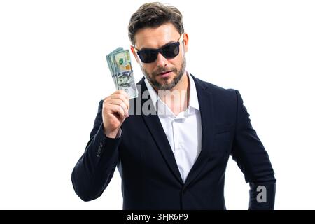 Mann anonym hält selbstbewusst Bargeld. Mann im Anzug hält Dollar für Betrug. Anonymes Geschäftsporträt zeigt Mann mit US-Dollar. Finanzkonzept Stockfoto