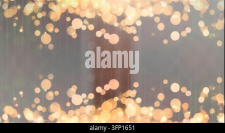 Weiche goldene Bokeh-Lichter bilden einen traumhaften, warmen Hintergrund. Stockfoto