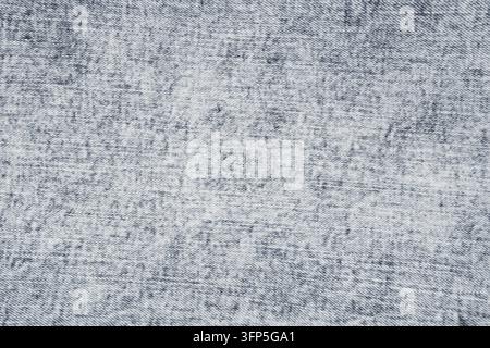 Hellblauer Denim-Stofftexturrenhintergrund. Nahaufnahme des klassischen gewaschenen Denim-Materials. Textile Oberfläche mit Baumwollgewebe-Muster für Modestoffe Stockfoto