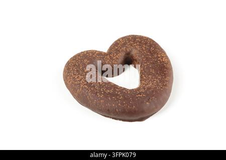 Schokoladen Lebkuchenplätzchen. Herzförmiges Lebkuchenplätzchen in Schokoladenglasur isoliert auf weißem Hintergrund. Schokoladen Lebkuchenherz Stockfoto