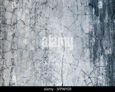 Feine rissige Betonwand graue Grunge-Textur Stockfoto