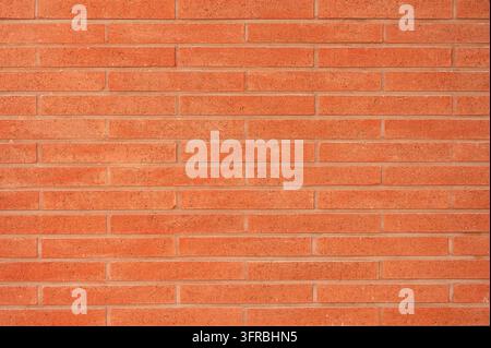 Roter Backsteinwandtexturrenhintergrund für architektonisches und Designkonzept Stockfoto