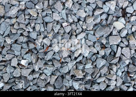 Hintergrund aus scharfen grauen Steinen, Ansicht von oben Stockfoto