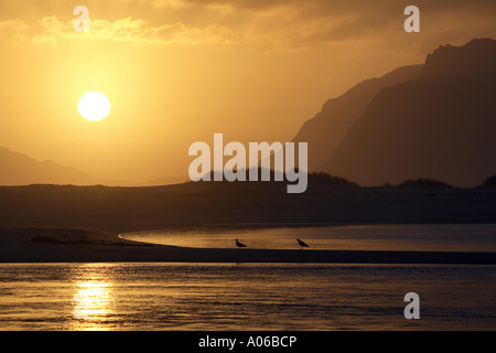 Strand bei Sonnenuntergang in Südafrika Stockfoto
