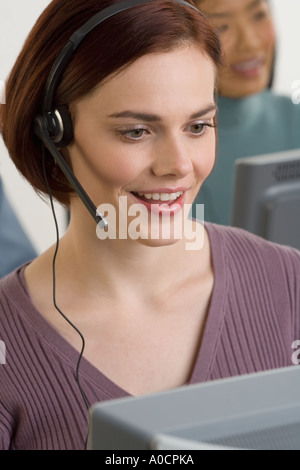 Weibliche Mitarbeiter des Kundendienstes Stockfoto