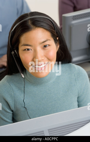 Weibliche Mitarbeiter des Kundendienstes Stockfoto