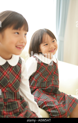 Nahaufnahme von zwei Mädchen lächelnd Stockfoto