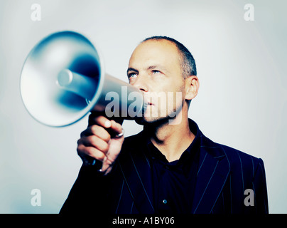 Mann mit einem Megaphon Stockfoto