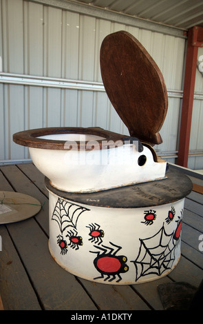 Eine humorvolle australische Toilette mit einem roten Rücken Spinne Foto von Bruce Miller Stockfoto