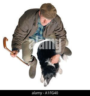 Hirt mit Border Collie Hund Stockfoto