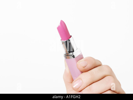 Hand halten Lippenstift Stockfoto