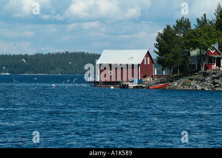 Spikkarna in der Nähe von Sundsvall in Nordschweden Ostsee Sommerhaus rote Küste Haus Heimat friedlich ruhigen Sommerurlaub Stockfoto