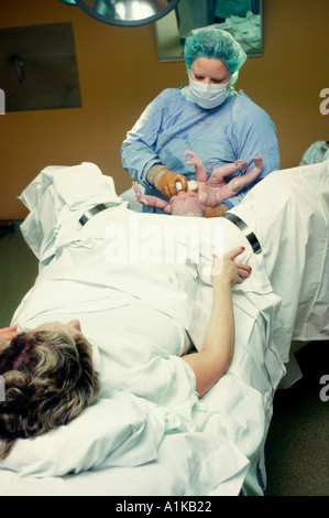 Mutter gebiert ein Kind Stockfoto