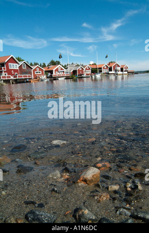 Schweden Schwedische Spikkarna in der Nähe von Sundsvall im nördlichen Schweden Ostsee Sommer rotes Haus Küste Strand Ferienhaus Startseite Stockfoto