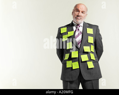 Geschäftsmann, tragen Haftnotizen Stockfoto