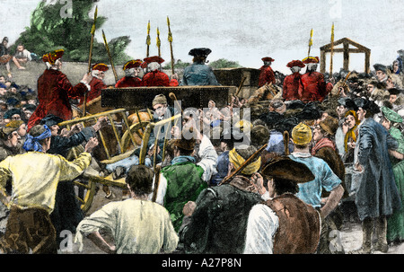 Gefangener gekarrt zu Tyburn für öffentliche Hinrichtung in England 1700. Hand - farbige Raster eines Howard Pyle Abbildung Stockfoto